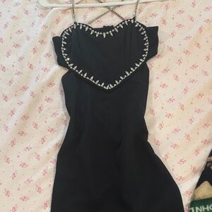 Elegant Black Dress with Embellished Neckline